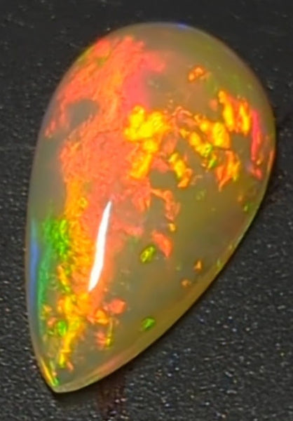 6.3ct Welo Opal Pear Cabochon AAAA Loose Ethiopian Fire Ball Flash