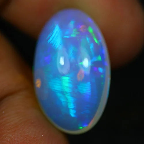 8ct Welo Opal Oval Cabochon AAA+ Blue Flash Loose Ethiopian 8ct Welo Opal Oval Cabochon AAA+ Blue Flash Loose Ethiopian