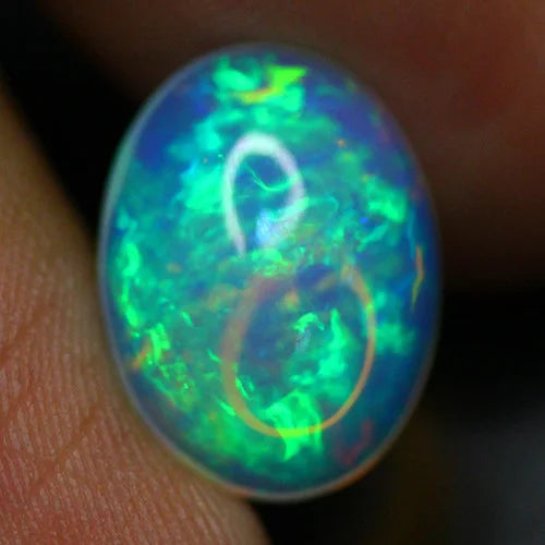 4.2ct Welo Opal Oval Cabochon AAA+ Green Fire Flash Loose Ethiopian