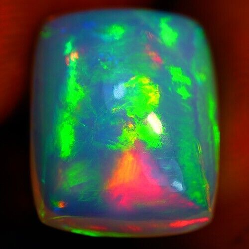 9.9ct Welo Opal Cushion Cabochon AAA+ Ethiopian Rolling Flash