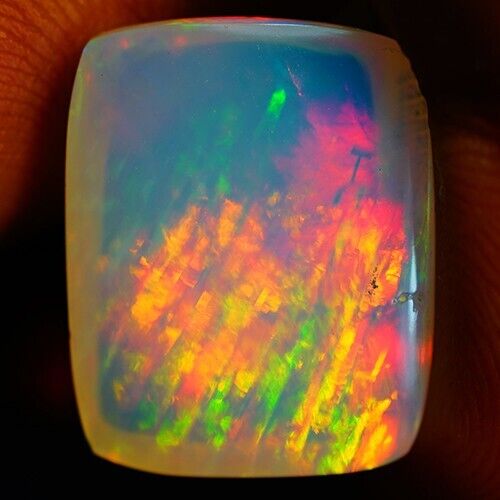 9.9ct Welo Opal Cushion Cabochon AAA+ Ethiopian Rolling Flash 9.9ct Welo Opal Cushion Cabochon AAA+ Ethiopian Rolling Flash