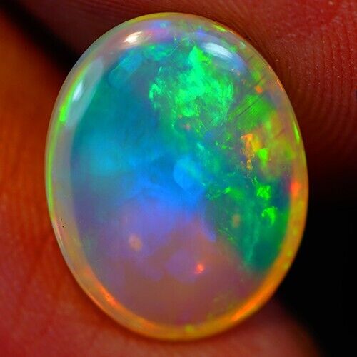 4.77ct Welo Opal Oval Cabochon AAA+ Loose Ethiopian 4.77ct Welo Opal Oval Cabochon AAA+ Loose Ethiopian