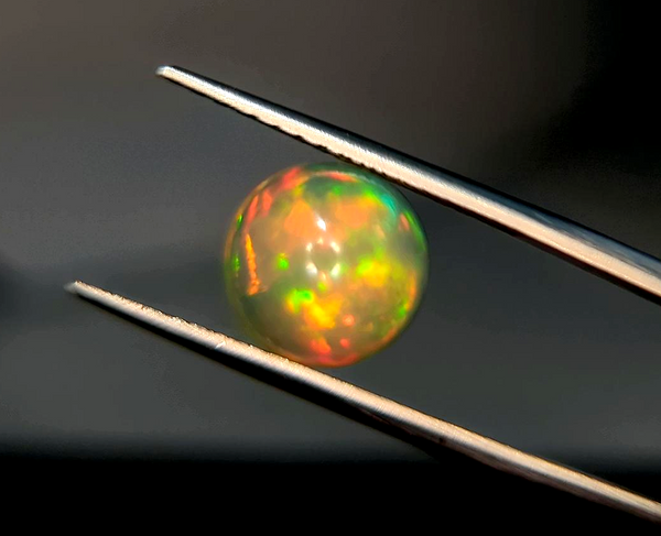 10.5mm Welo Opal Round Cabochon AAA+ Rainbow Flash Loose Ethiopian 10.5mm Welo Opal Round Cabochon AAA+ Rainbow Flash Loose Ethiopian