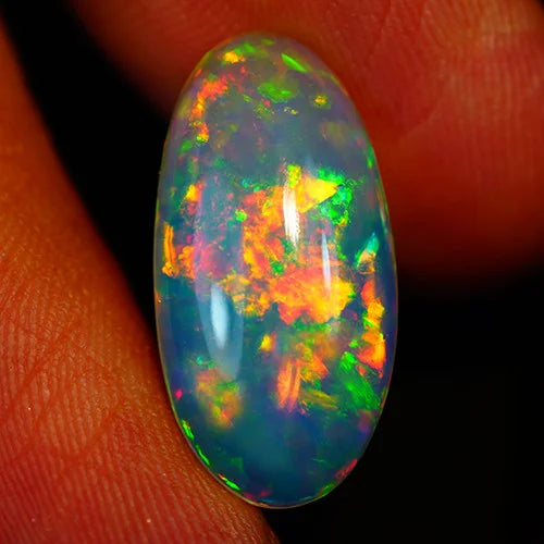 5.8ct Welo Opal Oval Cabochon AAA+ Rainbow Flash Loose Ethiopian