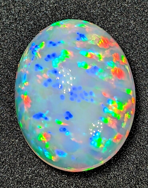 25.4ct Welo Opal Oval Cabochon AAAA Loose Prism Flash Ethiopian 25.4ct Welo Opal Oval Cabochon AAAA Loose Prism Flash Ethiopian