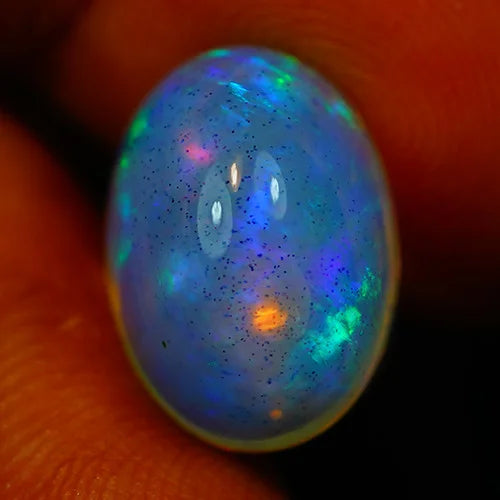 6.1ct Welo Opal Oval Cabochon AAA Blue Flash Loose Ethiopian