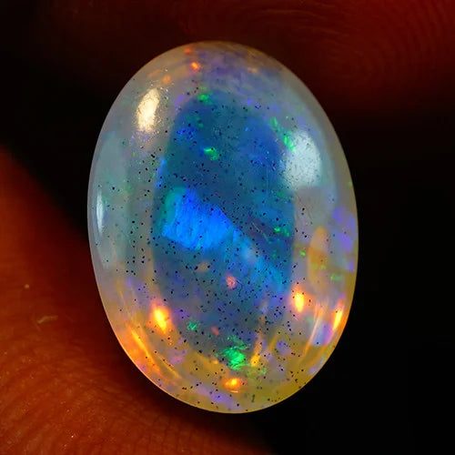 6.1ct Welo Opal Oval Cabochon AAA Blue Flash Loose Ethiopian