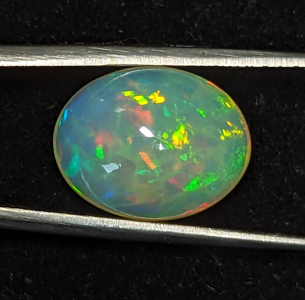 7.8ct Welo Opal Oval Cabochon AAAA Ethiopian Honeycomb Rainbow Loose VIDEO